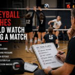 Volleyball coach observing a match and taking notes on serving pressure, rotations, block-defense, transition play, and decision-making.